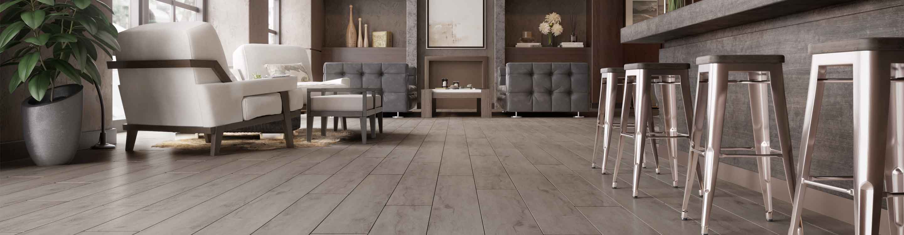 wood look Vinyl flooring in modern basement playroom with barn door to laundry space